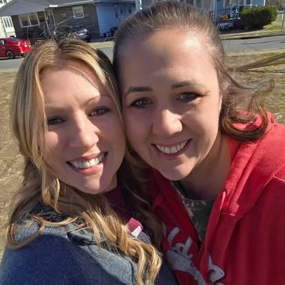 Two Green Neighbors Network organizers smiling outdoors