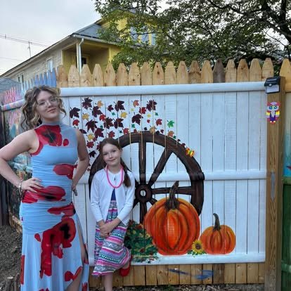 Pumpkin and autumn garden mural on the fence